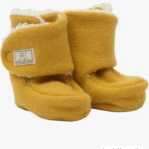 Moby wrap , organic wool PickaPooh booties, lots of baby girl outfits